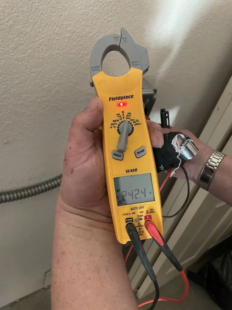 Voltage testing with clamp meter during Generator Installation in Pomona